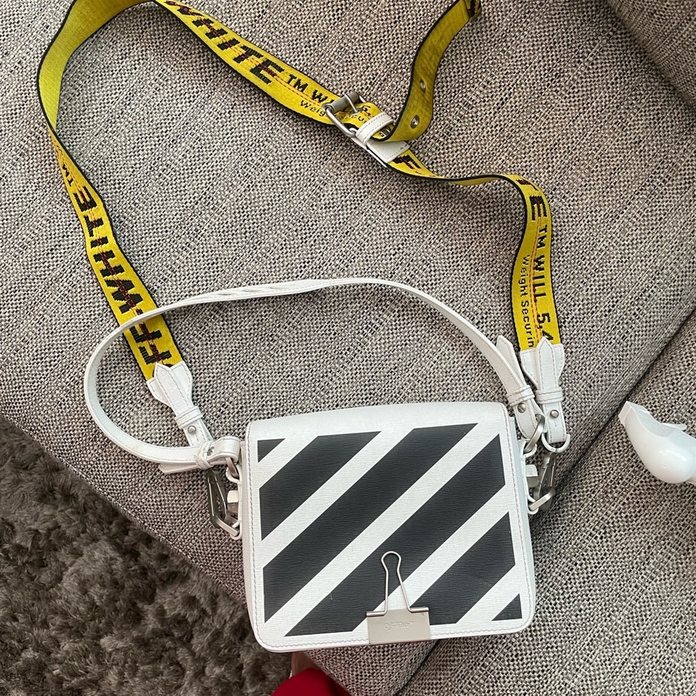 Off white bag in good condition! Will be cleaned before sent out b/c it’s white